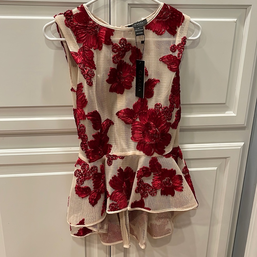 Large Garcia peplum top. Beautiful, detailed red flower embroidery. Heavy Mesh.
